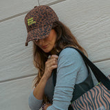 Gorra lavada animal print marrón